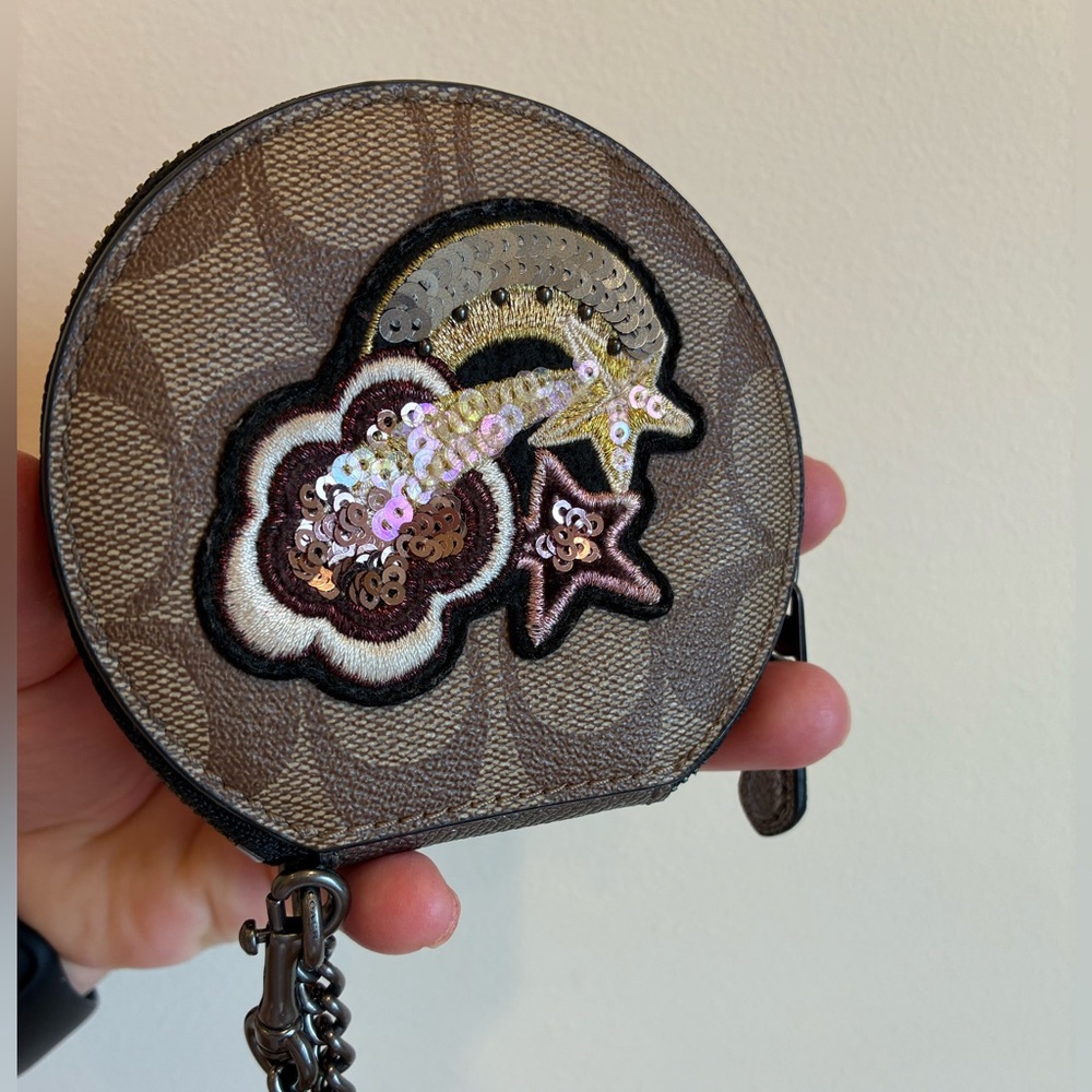 Coach Round Coin Case in Signature Canvas with Glitter Patch.